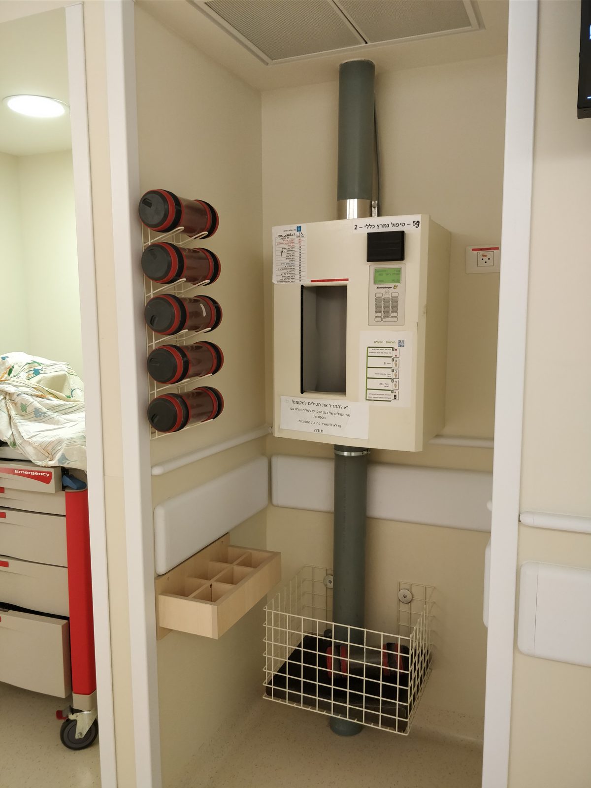 Modern hospital pneumatic tube station with plastic carriers